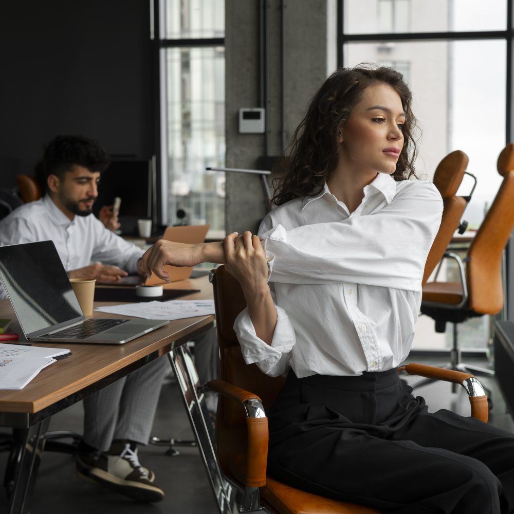 side-view-woman-stretching-work side-view-woman-stretching-work